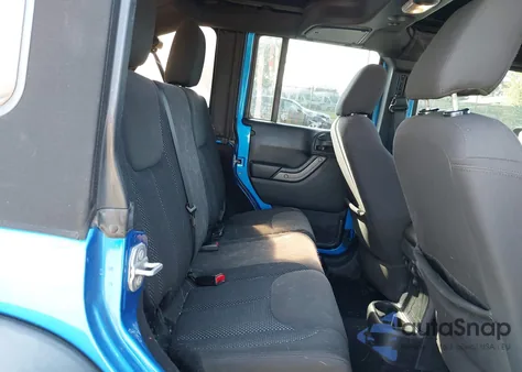 2016 Jeep Wrangler Unlimited Black Bear z USA, uszkodzony, nr VIN 1C4BJWDG1GL125582